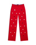 A pair of red corduroy trousers with a pattern of sheep and other small animals